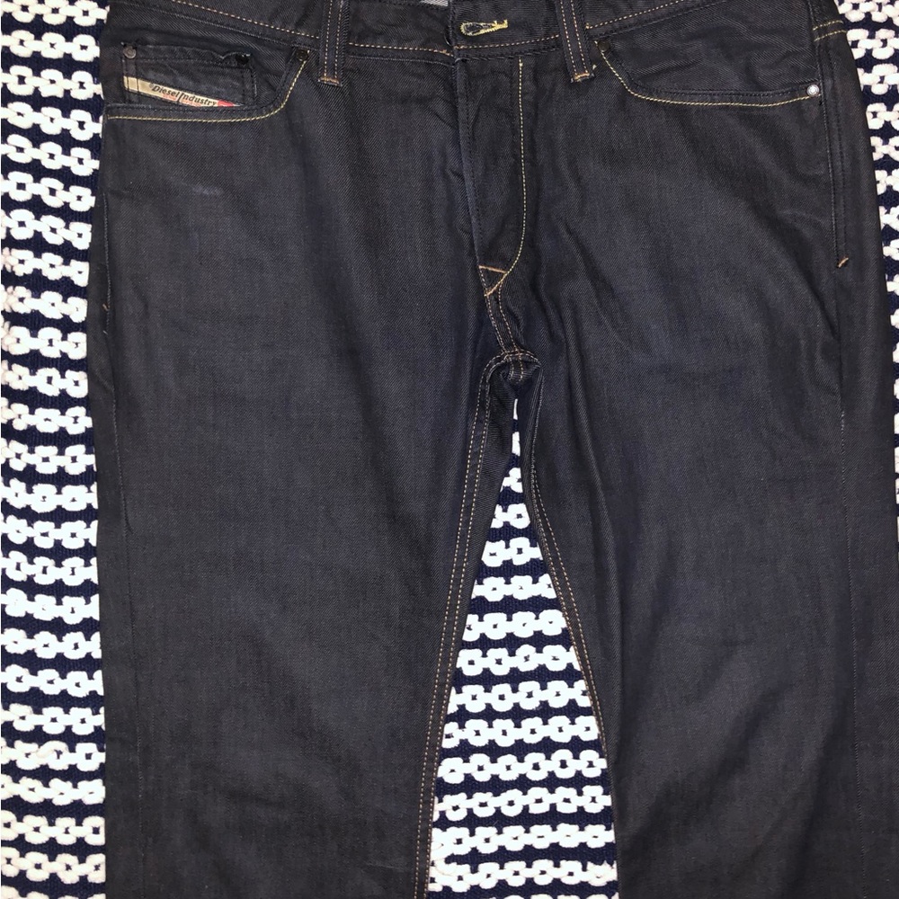 A Pair of Diesel Jeans Dark Color 34W 32L in Great Condition.